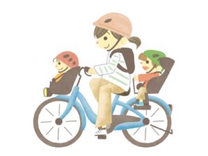 自転車で子供を乗せて走る母親